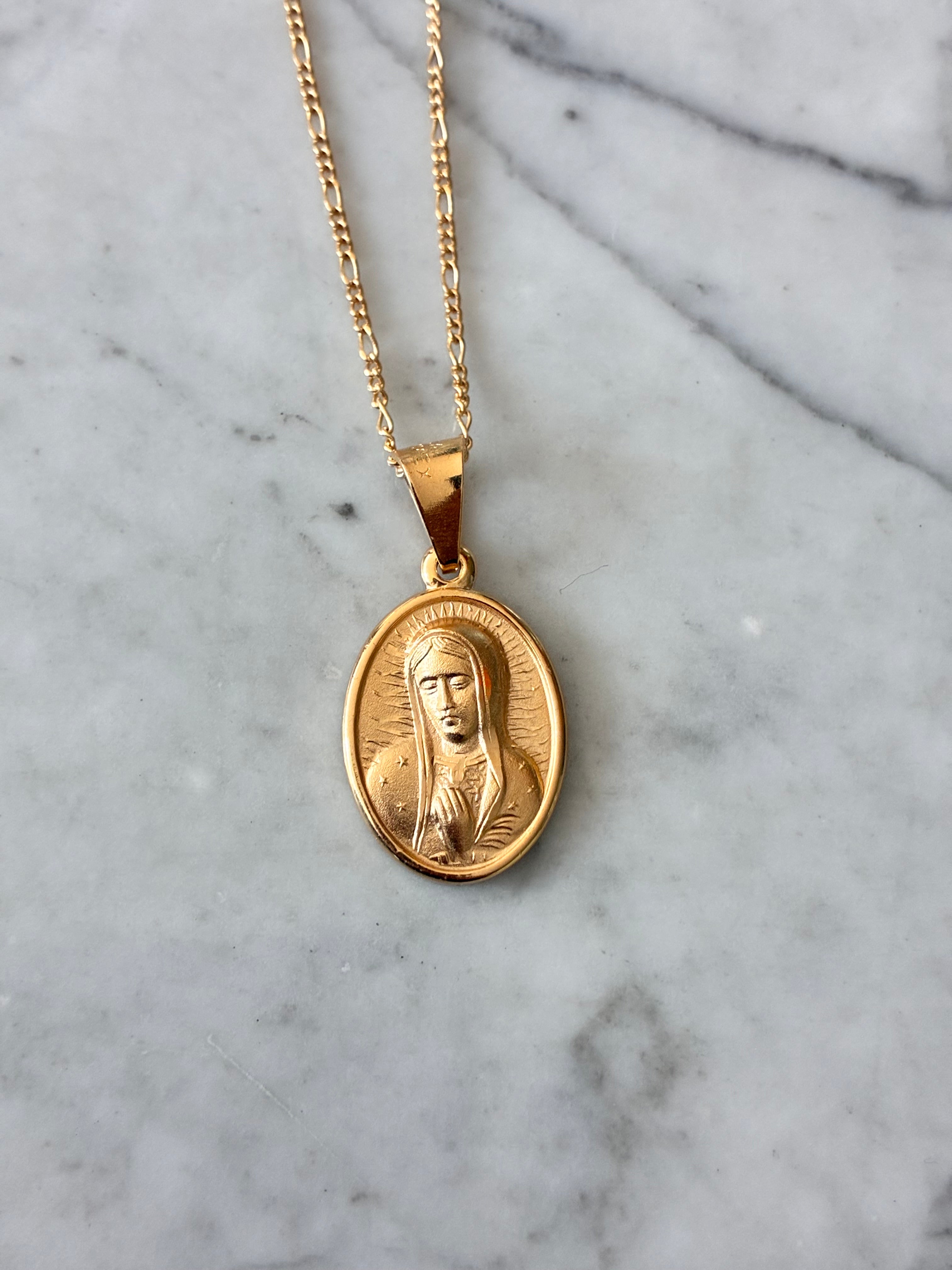 Medalla rostro VG chapa de oro