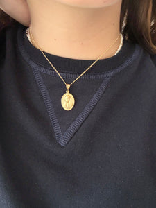 Medalla rostro VG chapa de oro