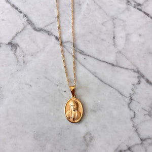 Medalla rostro VG chapa de oro