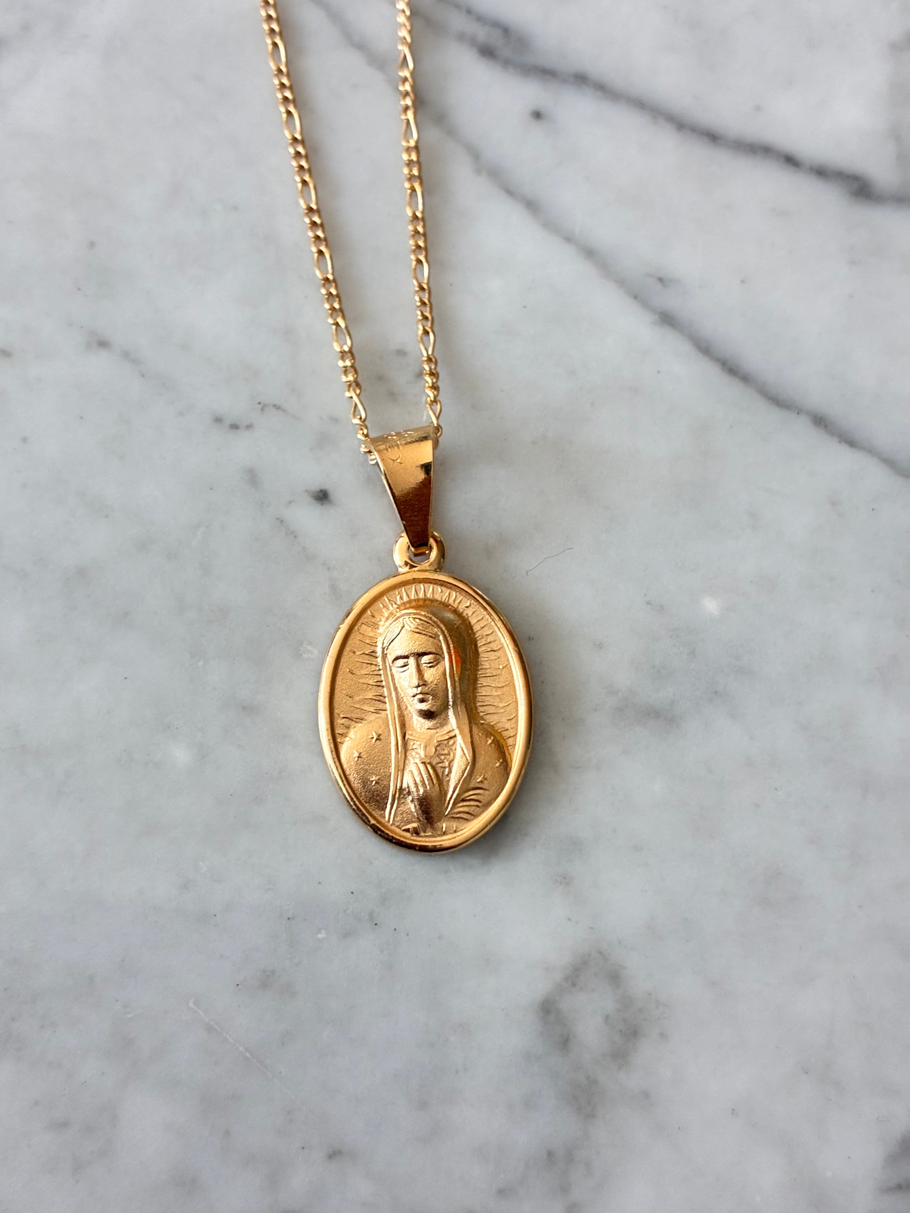 Medalla rostro VG chapa de oro
